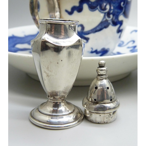 822 - A collection of silver including a silver mounted Oriental cup and dish, a pierced silver bon bon di... 