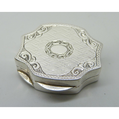 830 - An engraved silver pill box and a German .835 silver powder compact, 5cm, 49g total