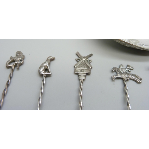 837 - A set of 12 white metal spoons with Continental control marks, one a/f, and a large white metal spoo... 