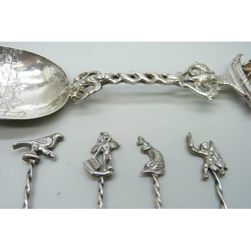 837 - A set of 12 white metal spoons with Continental control marks, one a/f, and a large white metal spoo... 