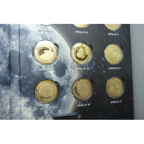 839 - An Apollo Mission set of cased commemorative coins including a Space Flown coin, 148/500, and a 14ct... 