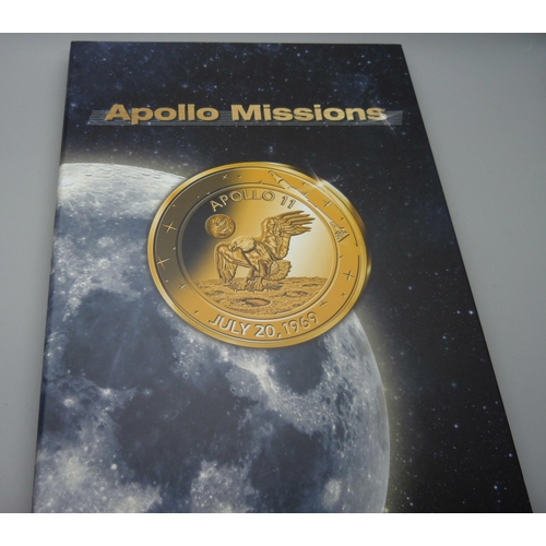 839 - An Apollo Mission set of cased commemorative coins including a Space Flown coin, 148/500, and a 14ct... 