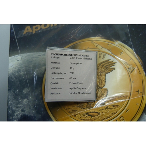 839 - An Apollo Mission set of cased commemorative coins including a Space Flown coin, 148/500, and a 14ct... 