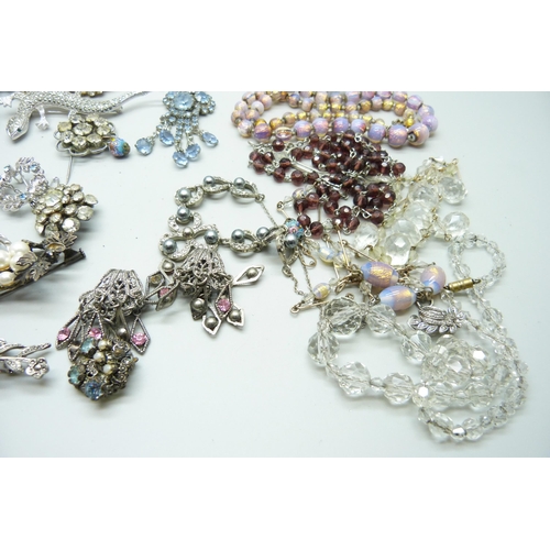 847 - A collection of costume jewellery including brooches and necklaces