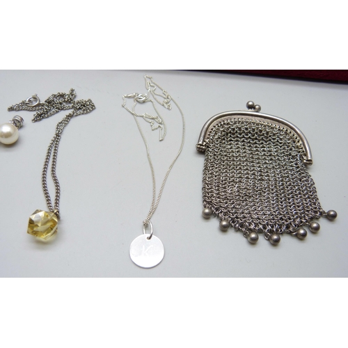 854 - A metal chainmail purse, a silver necklace, a pair of faux pearl earrings, a string of pearls and a ... 