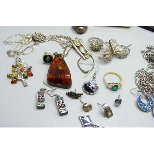 858 - A collection of jewellery - white metal chains lacking clasps, 67g, silver rings, a silver and amber... 