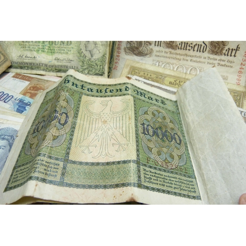 859 - A collection of UK and world banknotes