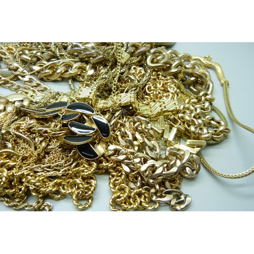 864 - A collection of gold tone jewellery