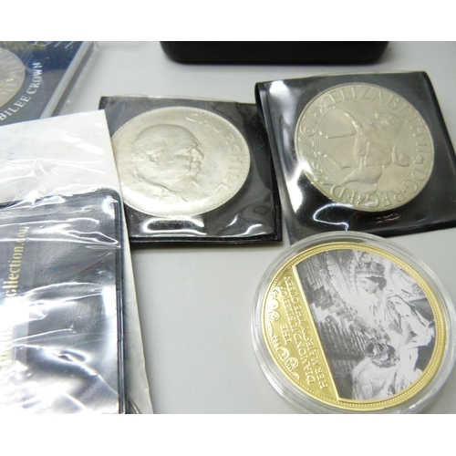 866 - Two silver proof five pound coins and a 1966 US half dollar together with other commemorative crowns... 