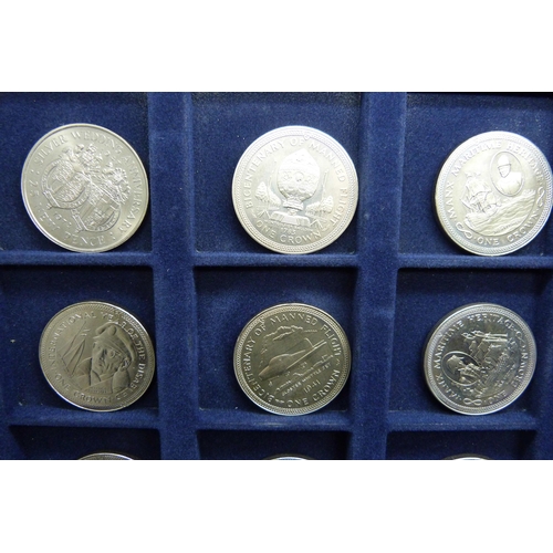 872 - A cased collection of 36 crown size coins including commemorative