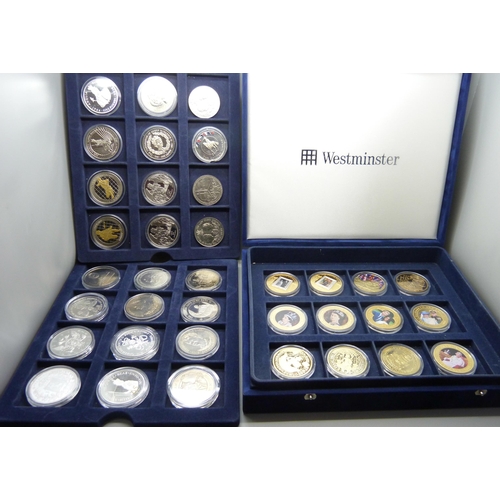 873 - A cased collection of 36 crown size coins including commemorative