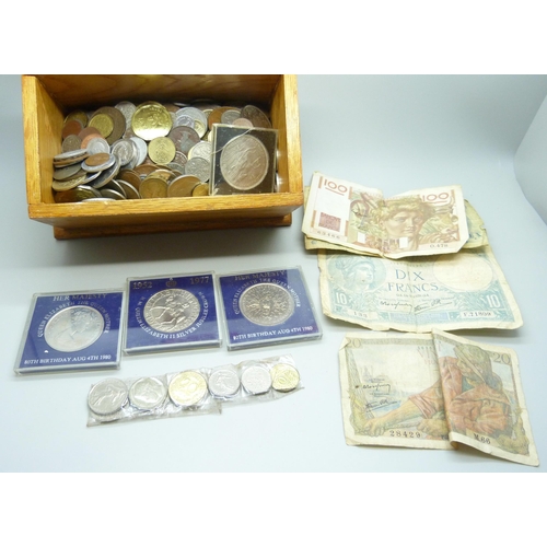 875 - A box of British and foreign coins, together with some bank notes