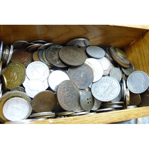 875 - A box of British and foreign coins, together with some bank notes