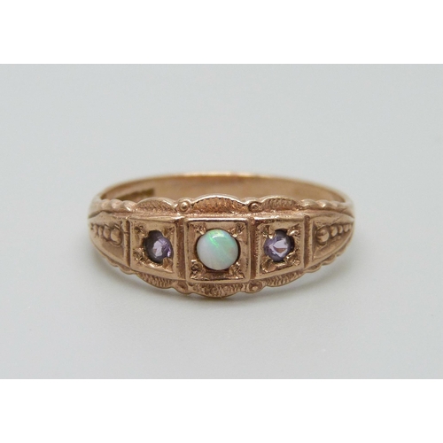 887 - A 9ct gold, opal and amethyst ring, 2.7g, O