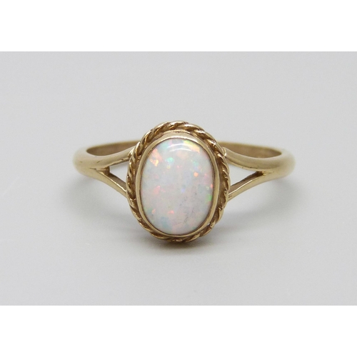 888 - A 9ct gold and opal ring, 1.8g, N/O