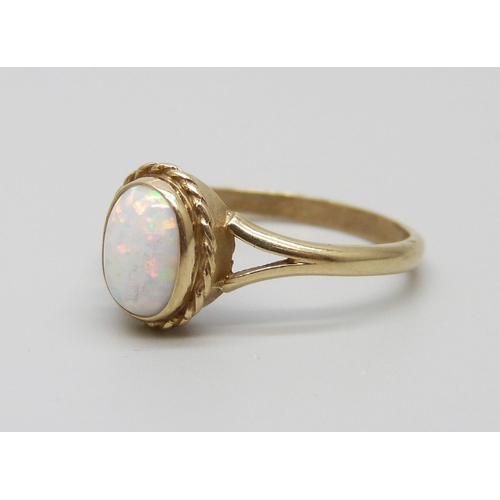 888 - A 9ct gold and opal ring, 1.8g, N/O