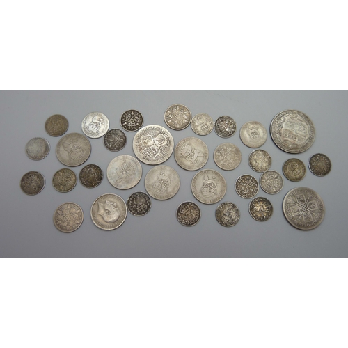 891 - A collection of silver coins, 28g, and half silver coins, 77g