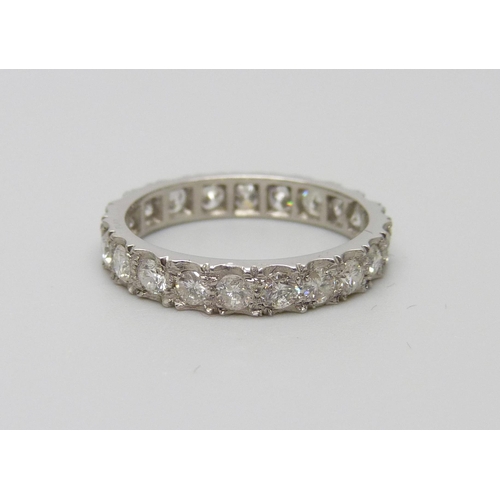 895 - A platinum and diamond eternity ring, shank marked PLAT, 3g, L