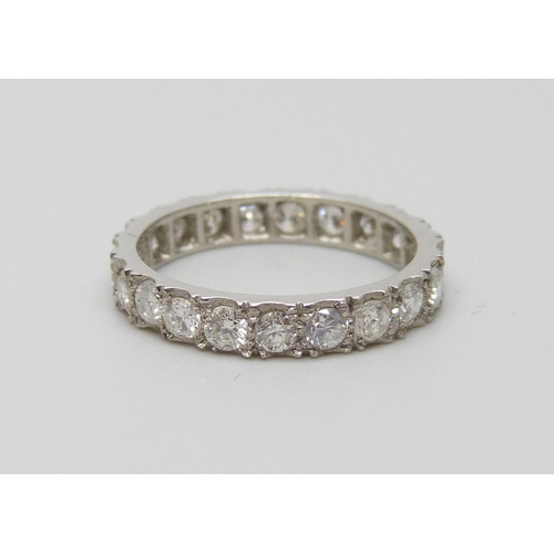 895 - A platinum and diamond eternity ring, shank marked PLAT, 3g, L