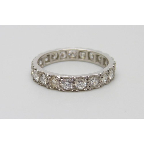 895 - A platinum and diamond eternity ring, shank marked PLAT, 3g, L