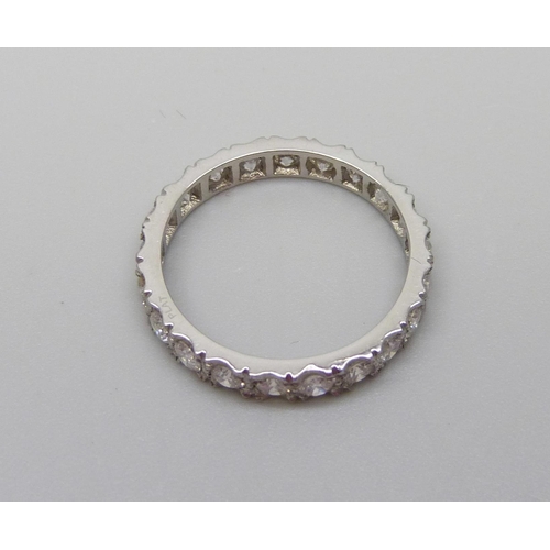 895 - A platinum and diamond eternity ring, shank marked PLAT, 3g, L