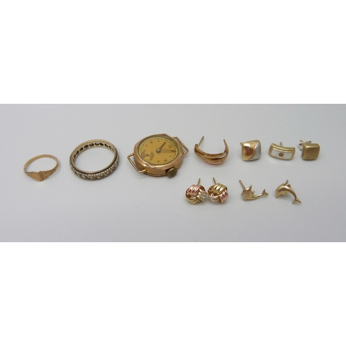 897 - A lady's 9ct gold watch head (a/f case split), 9ct gold and yellow metal earrings, a 9ct gold and si... 