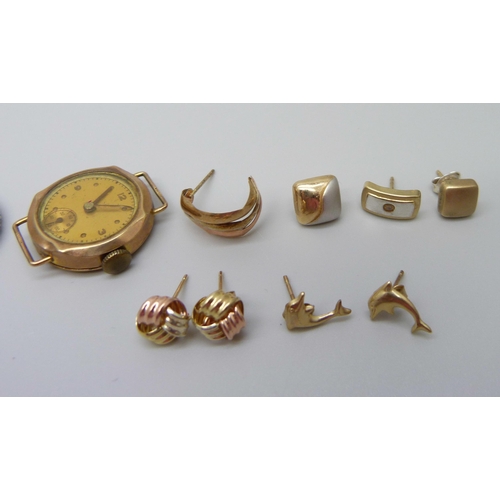 897 - A lady's 9ct gold watch head (a/f case split), 9ct gold and yellow metal earrings, a 9ct gold and si... 