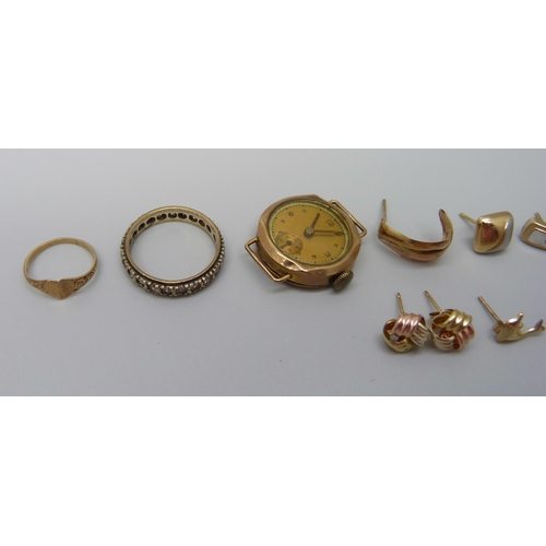 897 - A lady's 9ct gold watch head (a/f case split), 9ct gold and yellow metal earrings, a 9ct gold and si... 