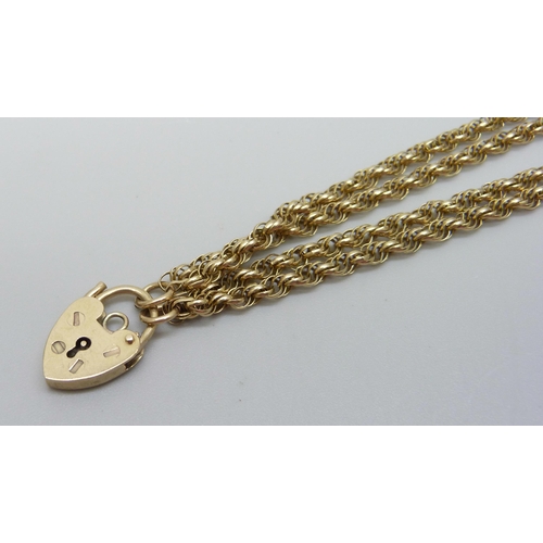 902 - A 9ct gold double strand rope twist bracelet with padlock clasp, 5.4g, 16cm