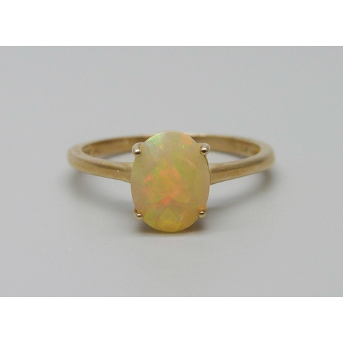 907 - A 10k gold and faceted opal ring, 1.7g, P