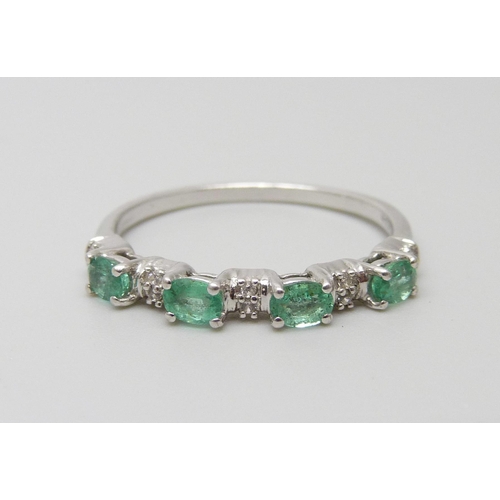 932 - A 9ct white gold, Zambian emerald and zircon ring, 2.2g, U