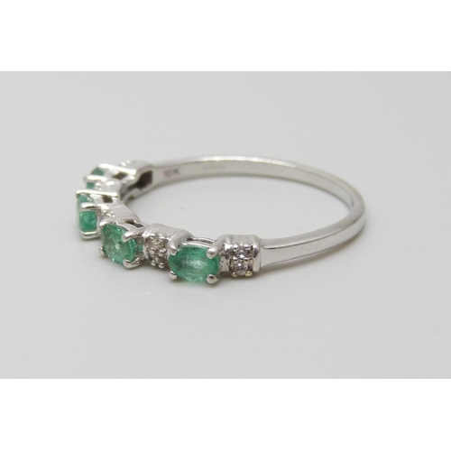 932 - A 9ct white gold, Zambian emerald and zircon ring, 2.2g, U