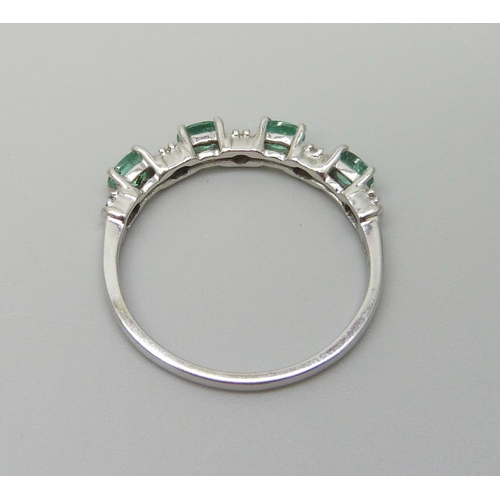 932 - A 9ct white gold, Zambian emerald and zircon ring, 2.2g, U