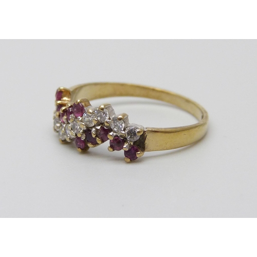 936 - A 9ct gold, ruby and zircon ring, 1.4g, K