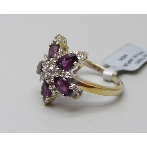 941 - A silver gilt almandine garnet and white topaz cluster ring, U