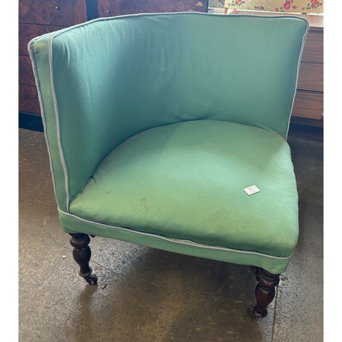 215 - A Victorian mahogany and fabric upholstered corner chair