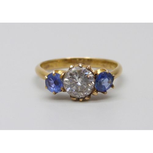 981 - A yellow metal, sapphire and diamond ring, stamped 18ct, diamond approximately 1ct, 3.3g, N