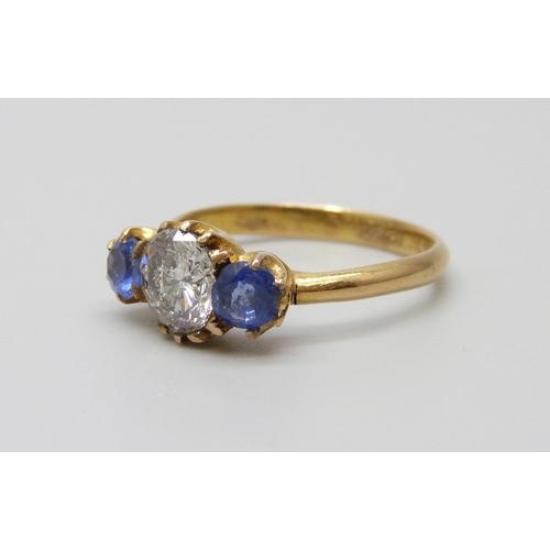 981 - A yellow metal, sapphire and diamond ring, stamped 18ct, diamond approximately 1ct, 3.3g, N