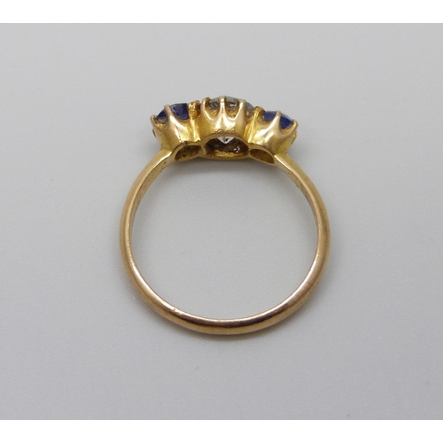 981 - A yellow metal, sapphire and diamond ring, stamped 18ct, diamond approximately 1ct, 3.3g, N