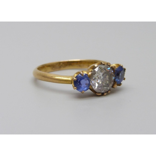 981 - A yellow metal, sapphire and diamond ring, stamped 18ct, diamond approximately 1ct, 3.3g, N