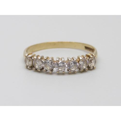 984 - A 9ct gold ring set with five white stones, 1.3g, N