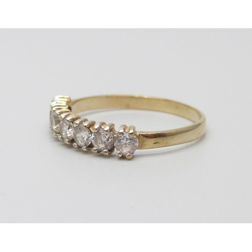 984 - A 9ct gold ring set with five white stones, 1.3g, N