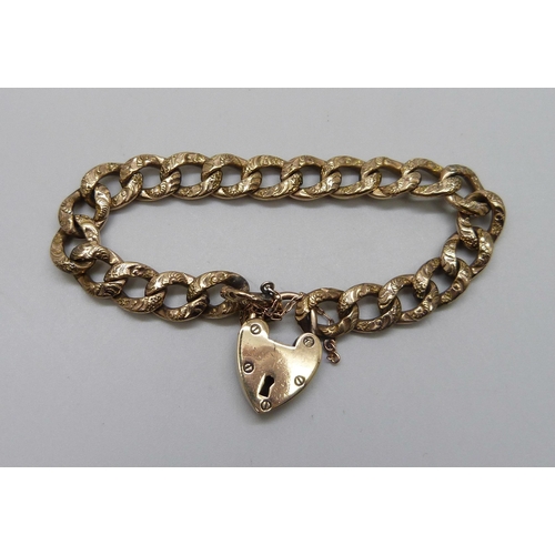 988 - A Victorian gilt engraved curb link bracelet