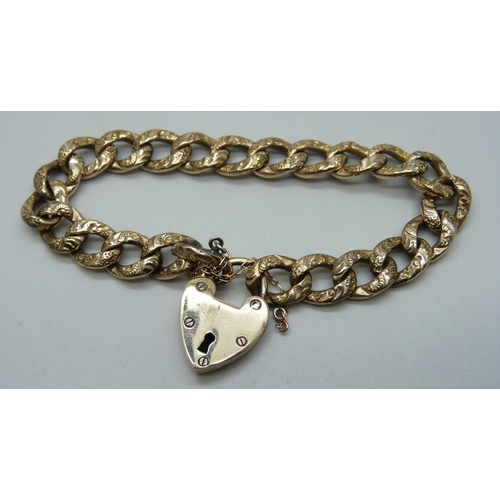 988 - A Victorian gilt engraved curb link bracelet