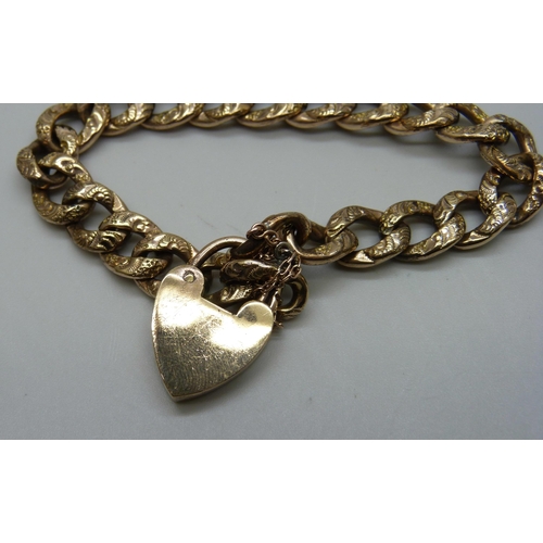 988 - A Victorian gilt engraved curb link bracelet