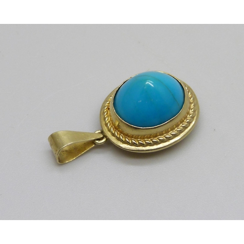 993 - A 14ct gold turquoise set pendant, 4.4g, 2.5cm including bale