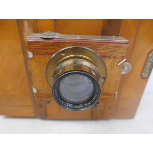 5047 - A vintage whole plate mahogany & brass studio camera with a Doppel-Antistigmat Correktar 1.5.4F/19mm... 