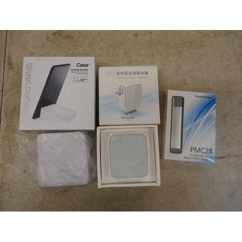 5053 - A quantity of electrical items including power banks, Wi-Fi extender, phone holder, etc