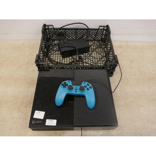 5058 - An Xbox One gaming console with power supply and one unbranded wired controller