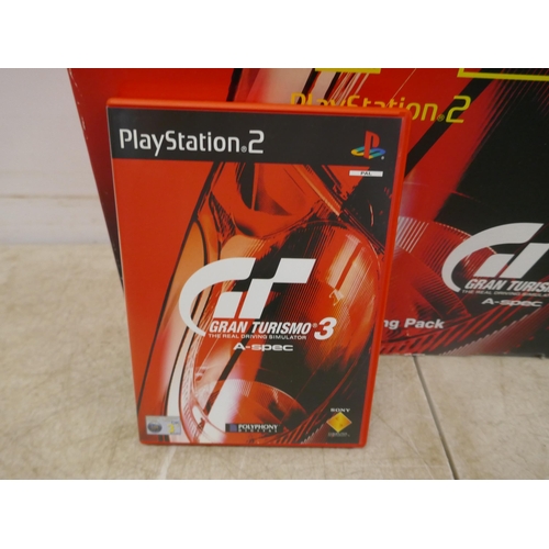 5059 - A limited edition GT3 Racing pack Playstation 2 with PS2 dual shock controller, power supply, av cab... 